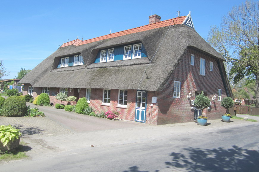 Ein schönes Reetdachhaus in Neuenhuntdorf